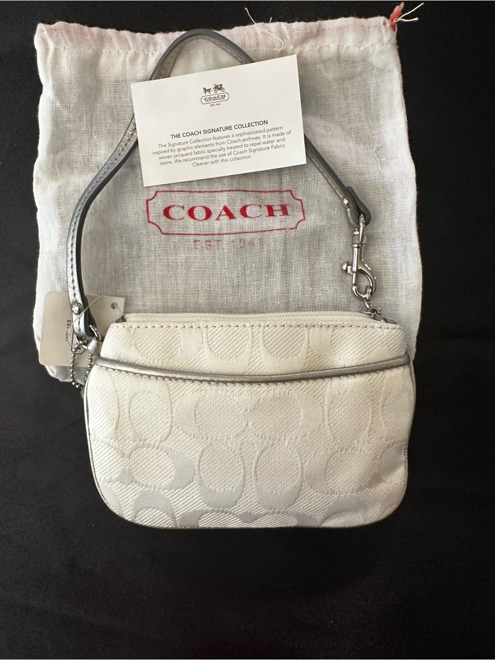 COACH Cream Signature Wristlet with Silver Trim - Picture 10 of 10